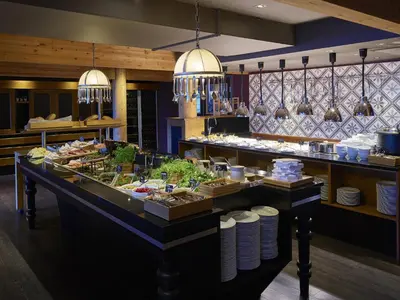 a buffet line with food on display in a restaurant at Fretheim Hotel in Flåm