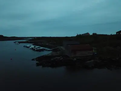 a view of a river with boats in the water at Kuvågen 23 in Vågenes