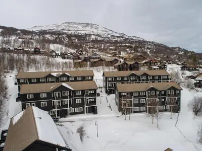 an aerial view of a town in the snow at Oppdal Alpintun, Stølen øvre - ski in ski out in Oppdal