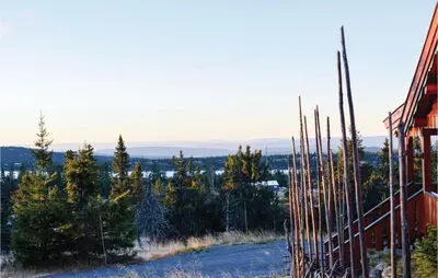 a view from the side of a building with trees at Two-Bedroom Holiday Home In Sjusjoen in Sjusjøen