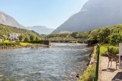 a view of a river with mountains in the background at Vik Pensjonat in Eidfjord