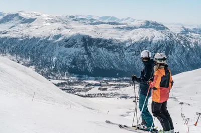 two people on skis on a snow covered mountain at Myrkdalen Resort Hotel in Myrkdalen