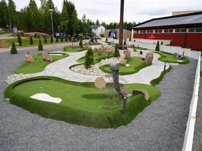 a model of a golf course with rocks and grass at Badeland Gjestegård in Raufoss