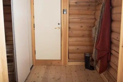 a door in a room with a wooden floor at Rondaplassen in Kvam