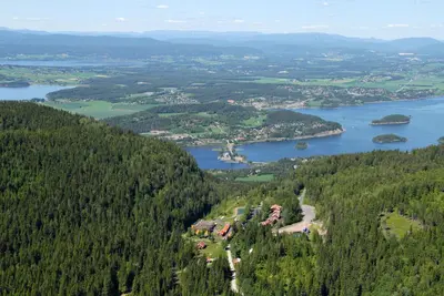 an aerial view of a town in the middle of a lake at Kleivstua Hotel near Krokskogen in Sundvollen