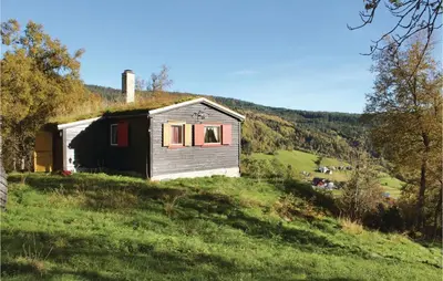 an old house with a grass roof on a hill at 3 Bedroom Beautiful Home In Voss in Vossevangen