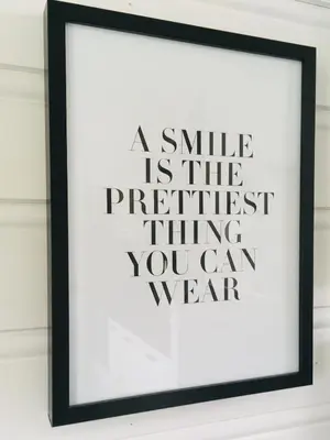 a smile is the prettiest thing you can wear framed art print at Osensjøen Camping in Valmen