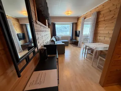 a living room with a couch and a table at Studio Apartment in Haukedalen in Førde