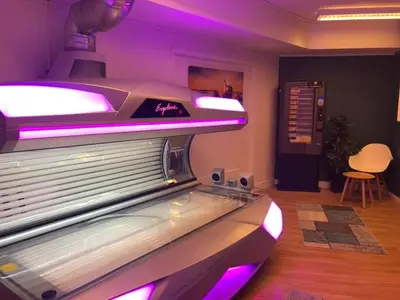 a room with a video game console with purple lights at Hotell Koselig in Kyrksæterøra