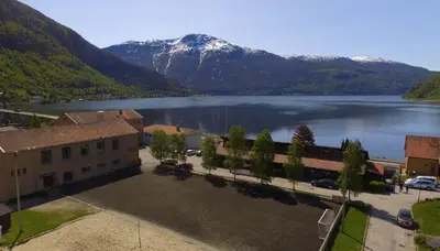 an aerial view of a lake with a mountain at Sogndal Bed & Breakfast in Sogndal