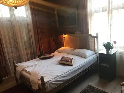 a bed with two pillows on it in a bedroom at Eidfjord Gjestgiveri in Eidfjord