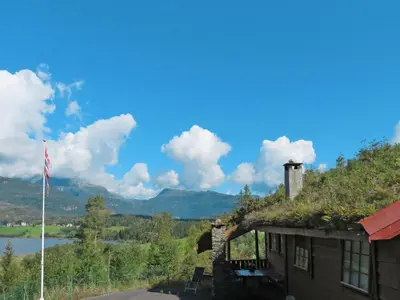 a view of the river and mountains from a house at Chalet Anna by Interhome in Eikelandsosen
