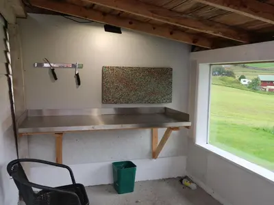 a shelf in a tiny house with a window at Holiday Home Ikjefjord by Interhome in Bjordal