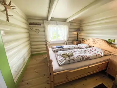a bedroom with two beds in a room at Holiday Home Lenebu by Interhome in Syvde