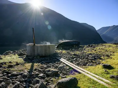 a hot spring on top of a mountain with the sun at Holiday Home Tor by Interhome in Arnefjord