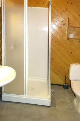 a shower stall in a bathroom with a toilet at Holiday Home Nanna by Interhome in Hyllestad