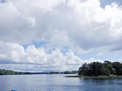 an island in the middle of a large body of water at Holiday Home Strøneneset by Interhome in Hagavik