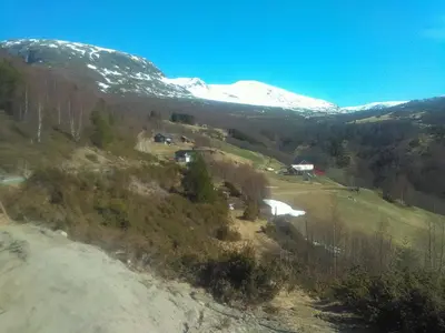 an aerial view of a mountain with snow at Bjørgo Gard - Stegastein in Aurland