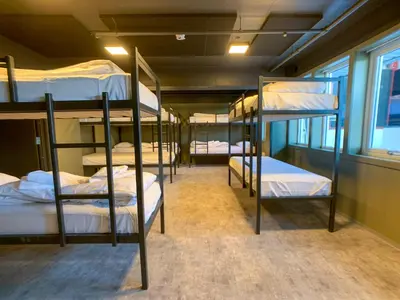 a group of bunk beds in a room at Spåtind Fjellhotell in Nord Torpa