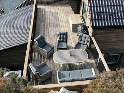 an aerial view of a deck with a table and chairs at 8 person holiday home in Urangsvåg in Ervik