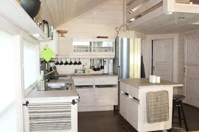 a kitchen with a sink and a counter top at Lev-Vel - 10 person cabin in Ål