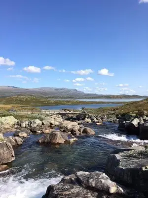 a river with rocks and water and a body of water at Actif 305 Apartment by Ål Ski Center in Ål
