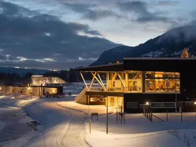 a building in the snow at night in the mountains at Topcamp Hallingdal - Ål in Ål