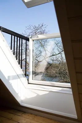 a window on a balcony with a view at Skjerjehamn in Ånneland