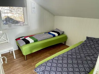 a small room with a bed and a window at 6 person holiday home in ETNE in Etnesjøen