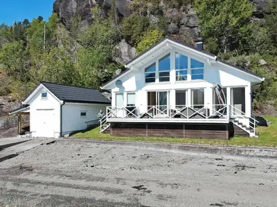 a house on the side of a mountain at 6 person holiday home in ETNE in Etnesjøen