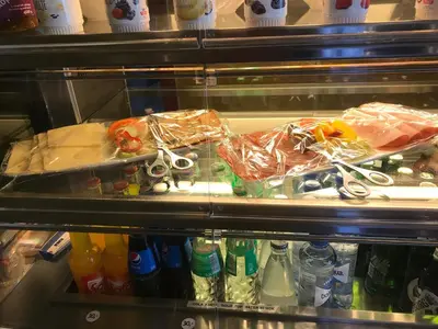 a refrigerator filled with lots of food and drinks at Eidfjord Hytter in Eidfjord