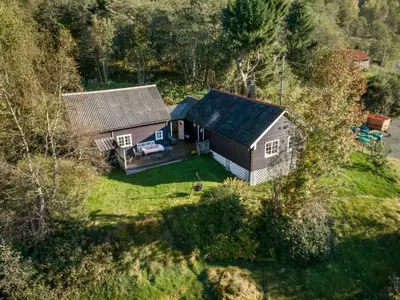 an aerial view of a small house in a field at Chalet Eiketun by Interhome in Olden