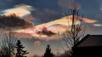 a colorful cloud formation in the sky at sunset at Ønskedrømmen hytteutleie in Brandbu