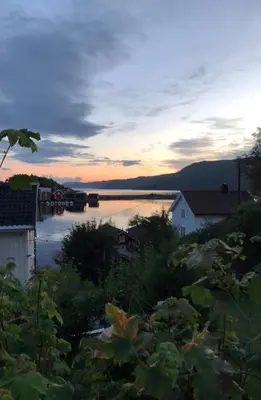 a view of a body of water at sunset at Pålberget in Råkvåg