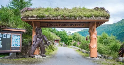 a sign that says troll foreforcer next to a road at Troll Fjordhytter in Syvde