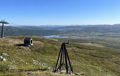 a view of a hill with a small building on it at Pet Friendly Home In Hovden I Setesdal in Hovden