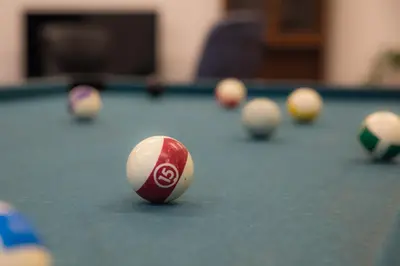 a billiard balls on a pool table at Sognhostel in Sørbø