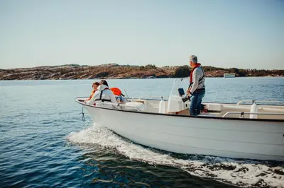 a group of people on a boat in the water at Panorama Rorbusuiter in Steinsland