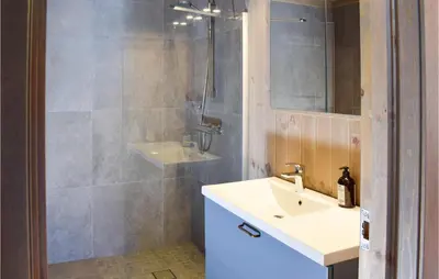 a bathroom with a sink and a shower at Amazing Home In Flå With Wifi in Flå