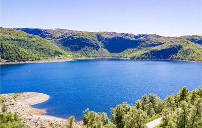 a view of a lake with mountains in the background at Stordalen in Bjordal