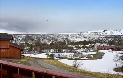 a winter view of a town with snow on the ground at 3 Bedroom Lovely Home In Nordberg in Skjåk