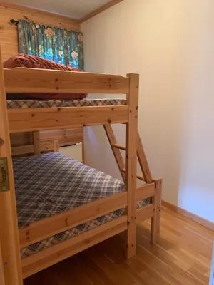 a bedroom with two bunk beds in a room at Norefri apartment with sauna at Nedre Norefjell Ski In- Ski Out in Noresund
