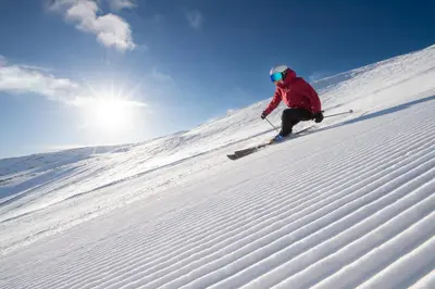 a person is skiing down a snow covered slope at Villa Sole, Trysil in Trysil