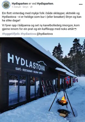 a screenshot of a post with a fire in front of a building at Hytte i Stryn med elbil lader in Stryn