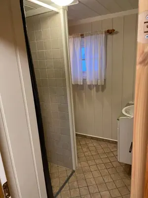 a bathroom with a shower and a sink at Ski and Bike-In and Out in Hafjell