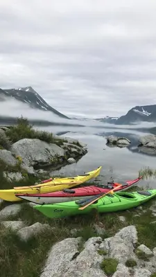 a group of kayaks on the shore of a lake at Oppdal Alpintun ski in ski out in Oppdal