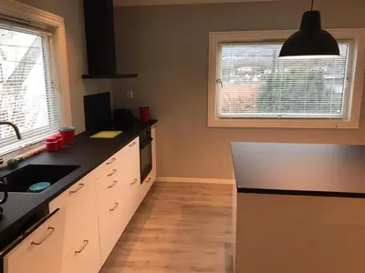 a kitchen with a sink and a counter top at # 1 Mountain View with free street parking in Bergen