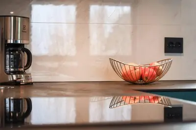 a bowl sitting on top of a kitchen counter at Flatanger Turkish Bath apartment in Lauvsnes