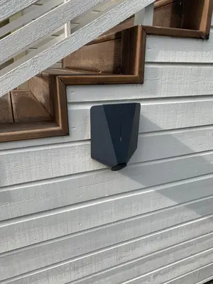 a speaker on the side of a house at Flatanger Turkish Bath apartment in Lauvsnes