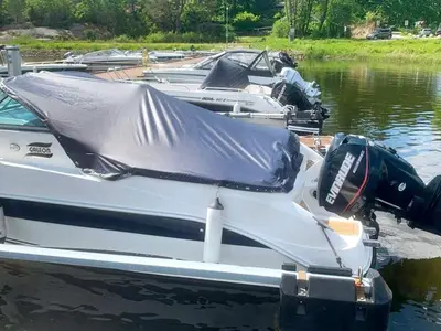 a group of boats parked in the water at 6 person holiday home in Aure-By Traum in Aure